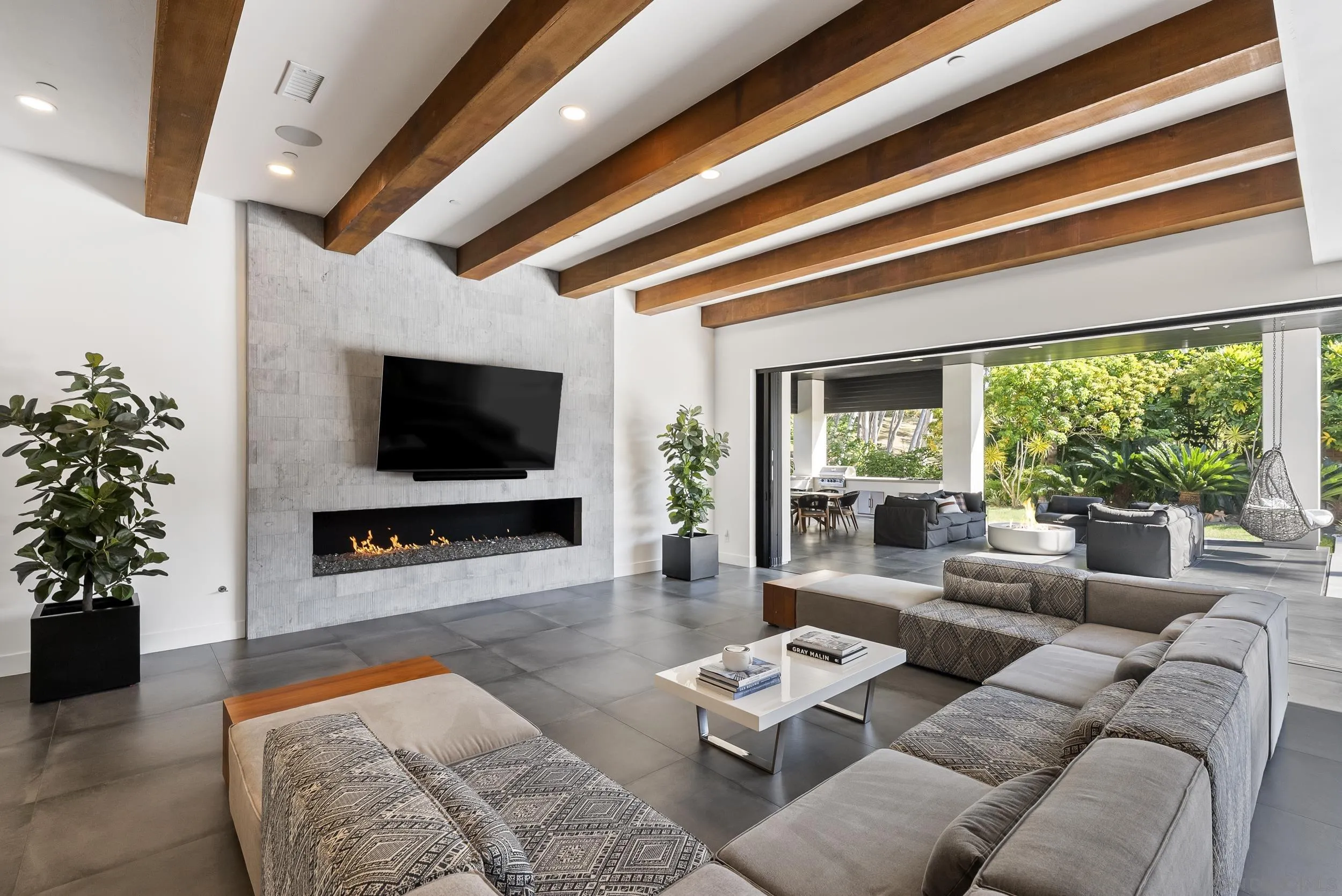 6850 Avenida De La Ronda Rancho Santa Fe, CA 92067 - Photo 9 of 40 a living room with furniture and a flat screen tv