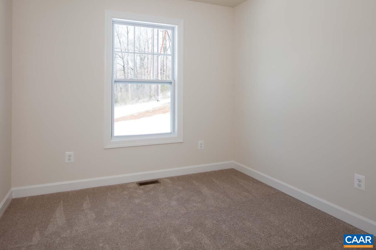 437 Rolkin Road Charlottesville, VA 22911 - Photo 14 of 26 an empty room with a window
