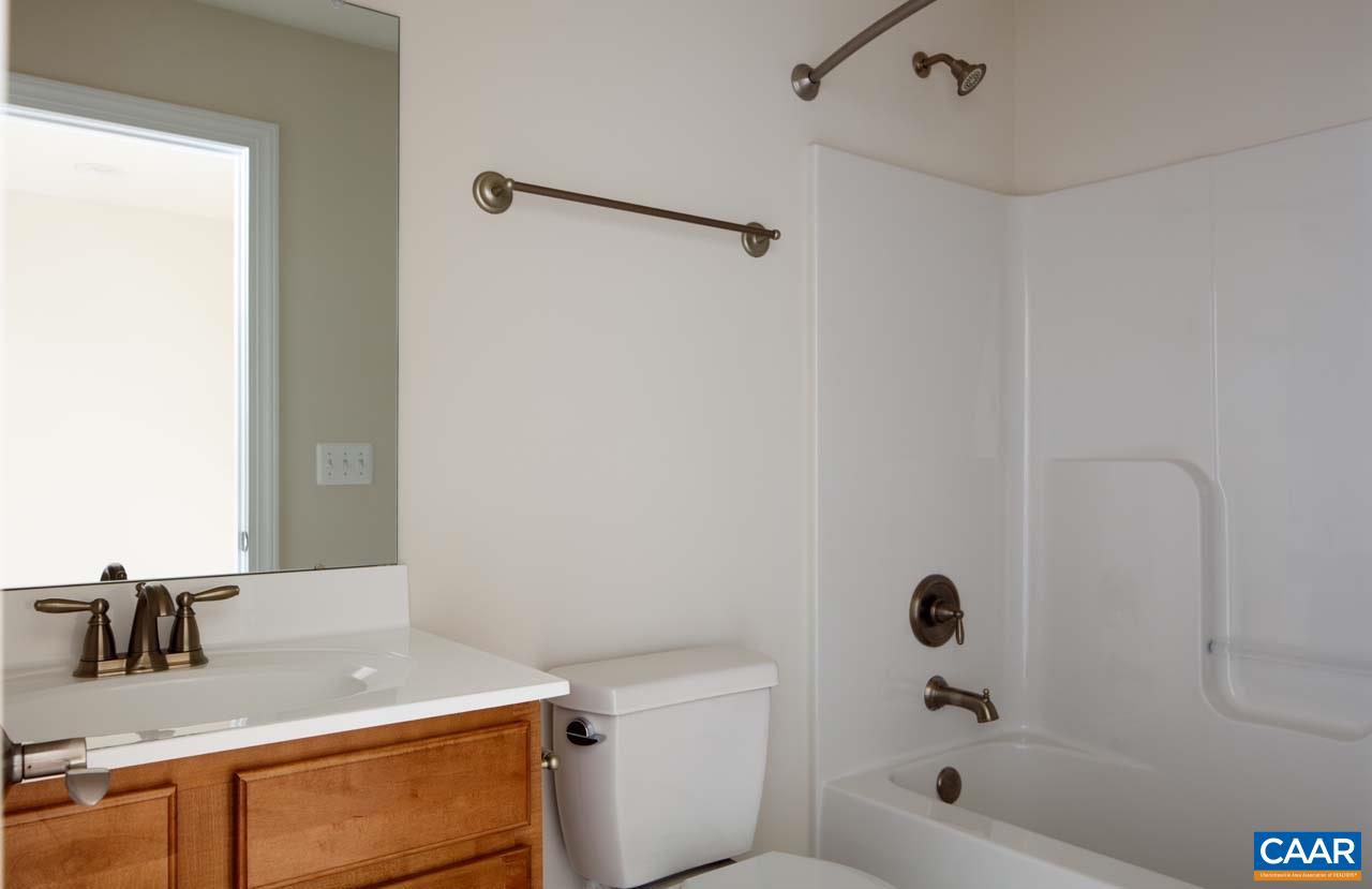 437 Rolkin Road Charlottesville, VA 22911 - Photo 18 of 26 a bathroom with a sink a toilet and shower