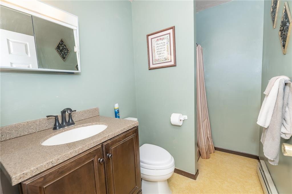 1751 Poulos Road Indiana, PA 15701 - Photo 21 of 34 a bathroom with a granite countertop sink and a mirror