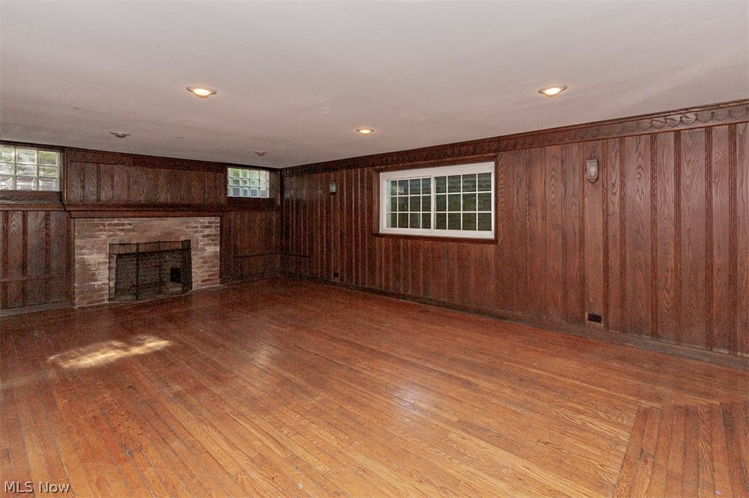 2830 East Overlook Road Cleveland, OH 44118 - Photo 27 of 32 Richly paneled Recreation or Club Room with hardwood floors and a Bar. Could enjoy myriad uses.