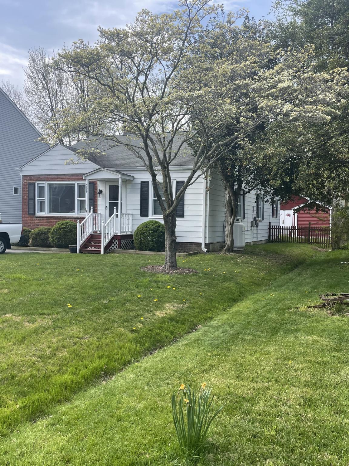 209 Beverley Avenue Edgewater, MD 21037 - Photo 10 of 13 a front view of house with yard and green space