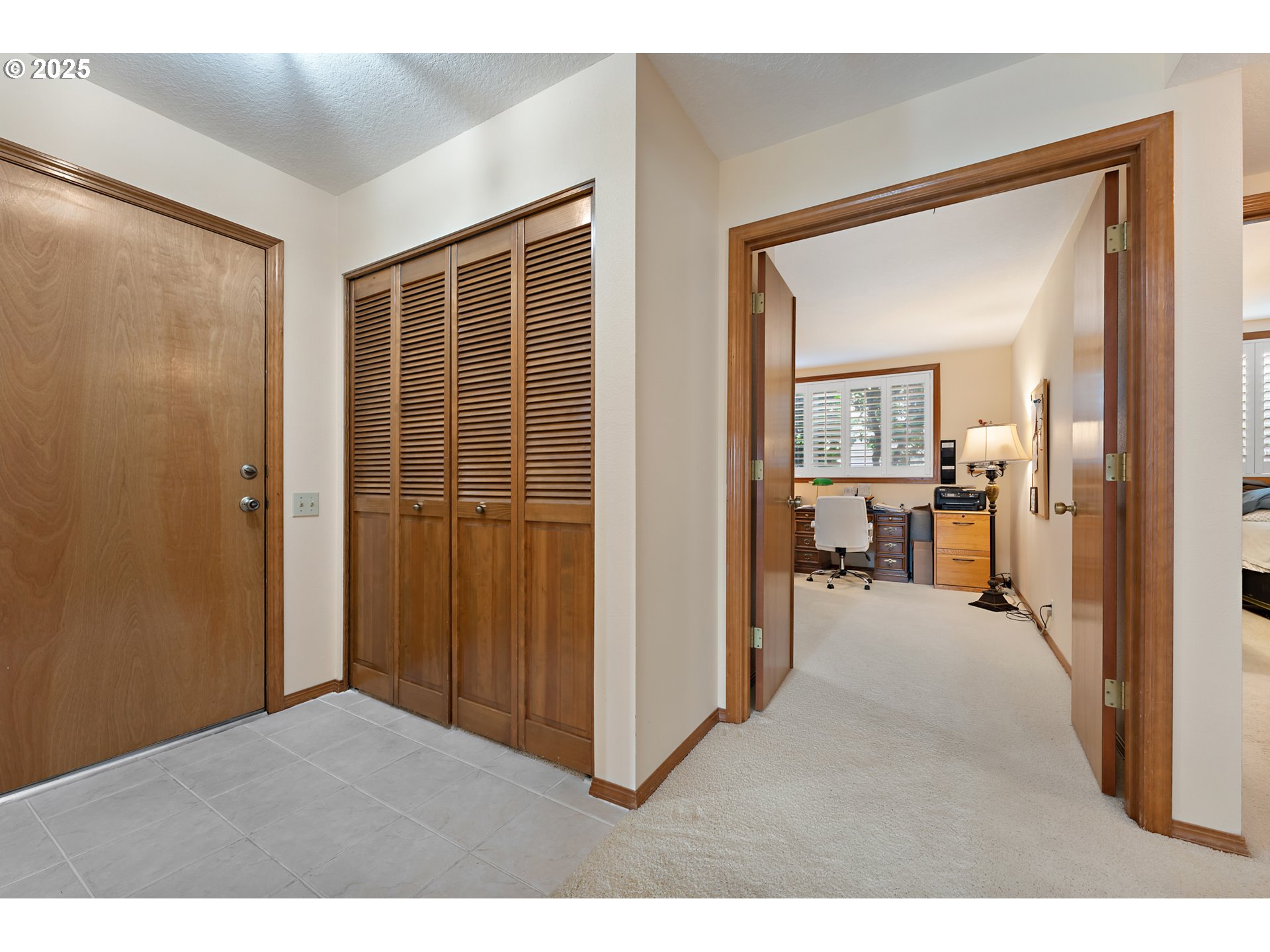 15435 Southwest 114th Court, Unit 99 Tigard, OR 97224 - Photo 17 of 40 a view of a room with a wardrobe space