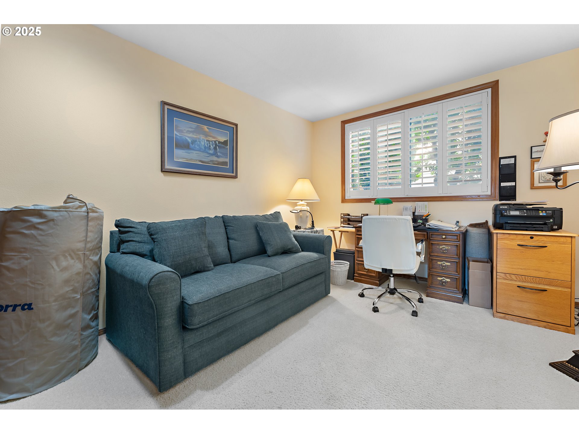 15435 Southwest 114th Court, Unit 99 Tigard, OR 97224 - Photo 18 of 40 a living room with furniture and a flat screen tv