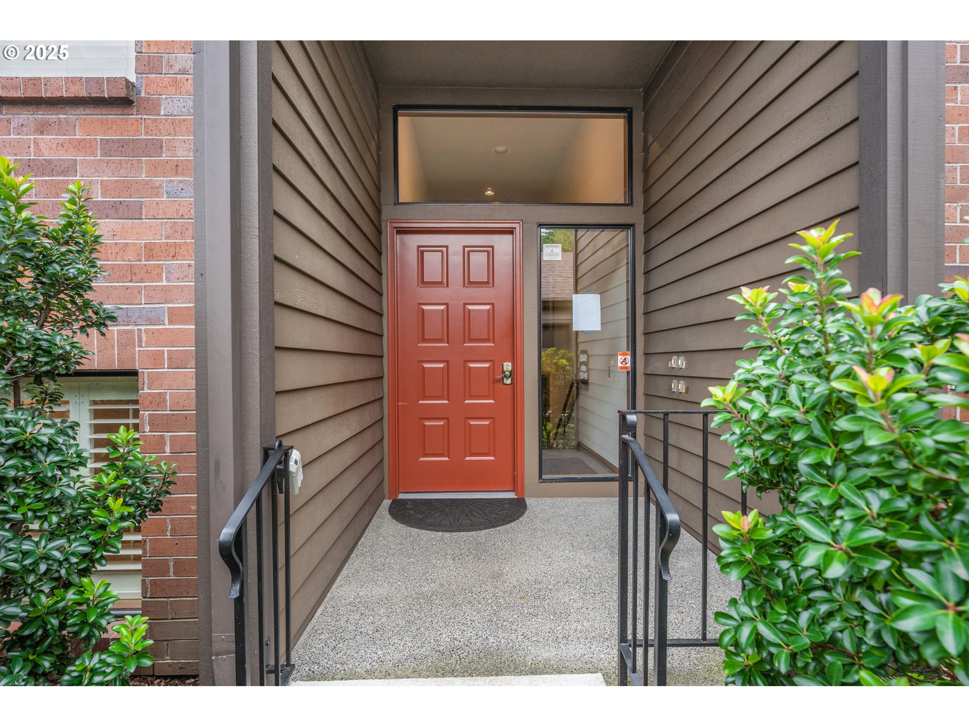 15435 Southwest 114th Court, Unit 99 Tigard, OR 97224 - Photo 2 of 40 a view of a house with a outdoor space