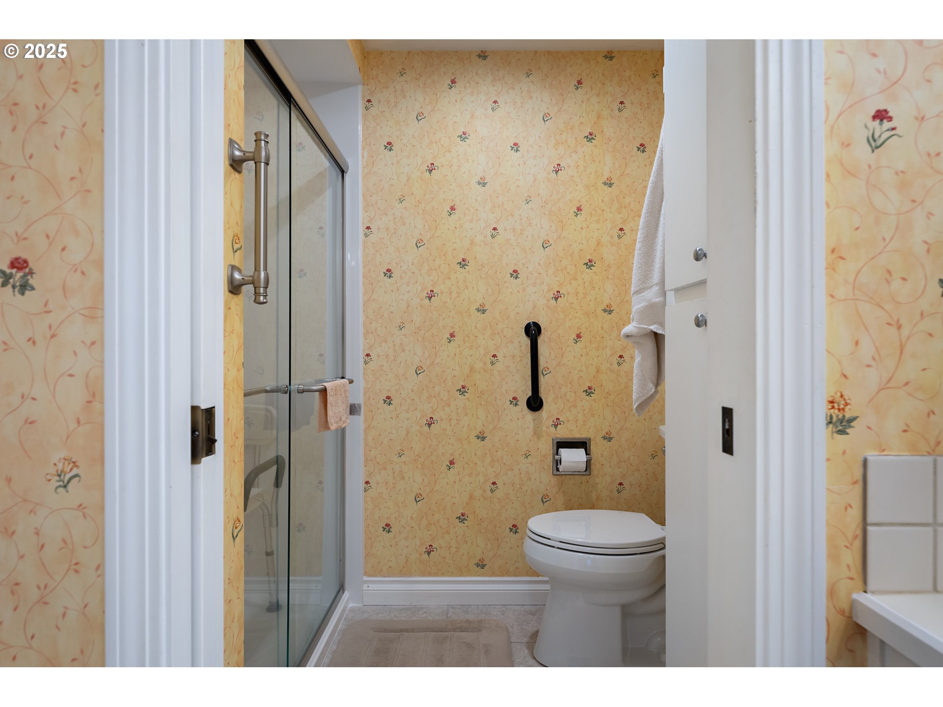15435 Southwest 114th Court, Unit 99 Tigard, OR 97224 - Photo 23 of 40 a bathroom with a toilet and a shower