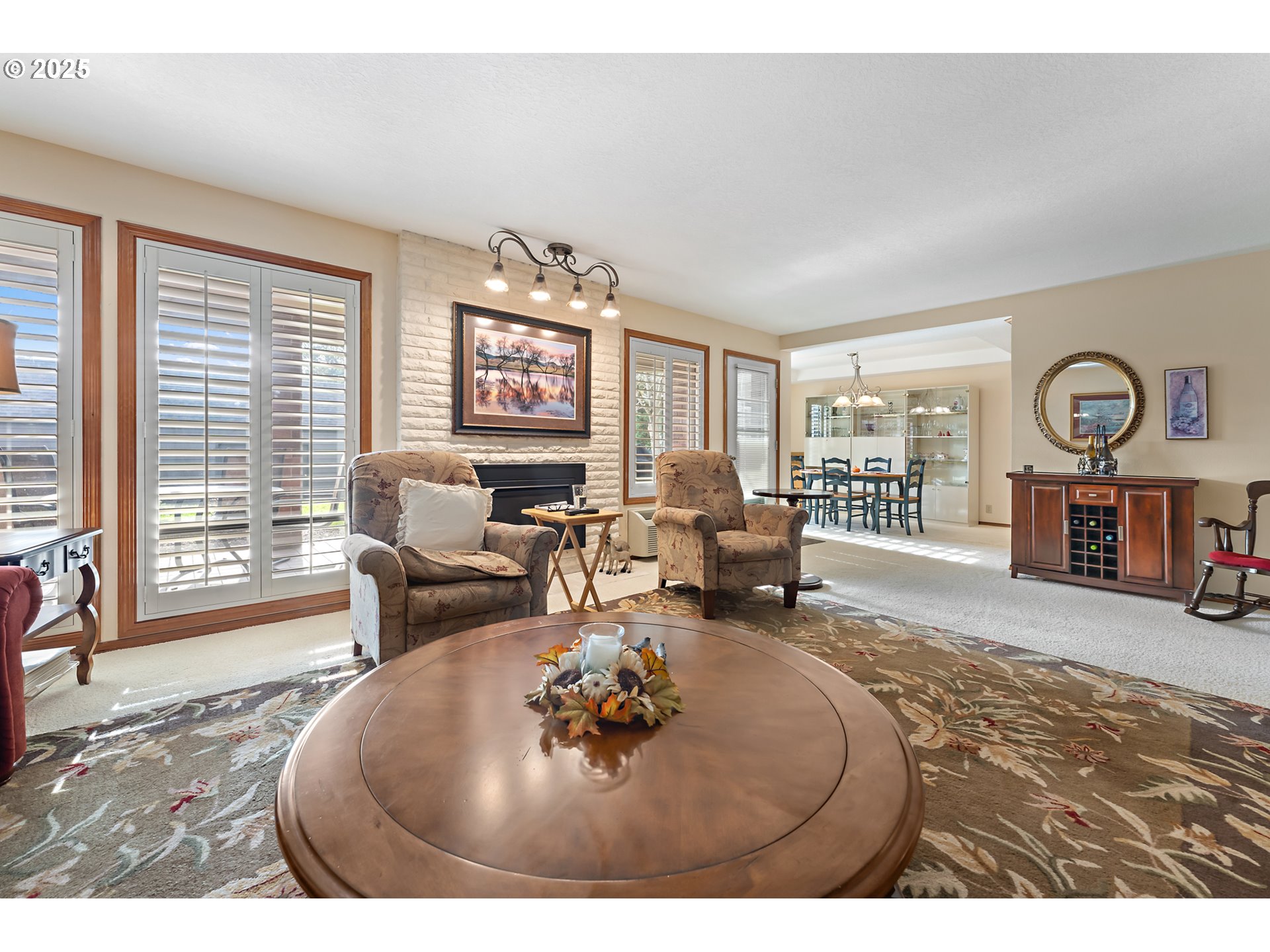 15435 Southwest 114th Court, Unit 99 Tigard, OR 97224 - Photo 7 of 40 a living room with furniture window and wooden floor