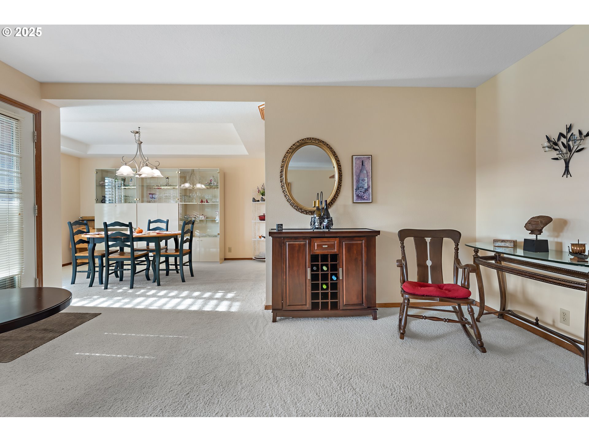 15435 Southwest 114th Court, Unit 99 Tigard, OR 97224 - Photo 8 of 40 a living room with furniture a table & chairs