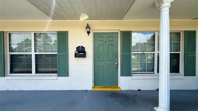 a house view with a outdoor space