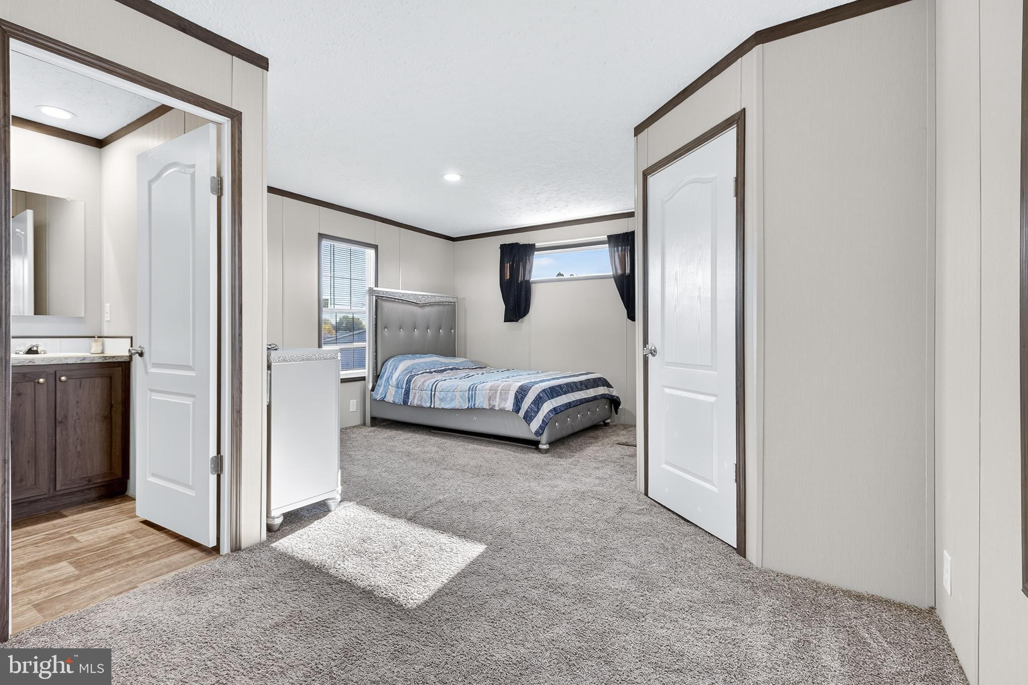 48 Dallas Drive Grantville, PA 17028 - Photo 10 of 30 a spacious bedroom with a bed and a mirror