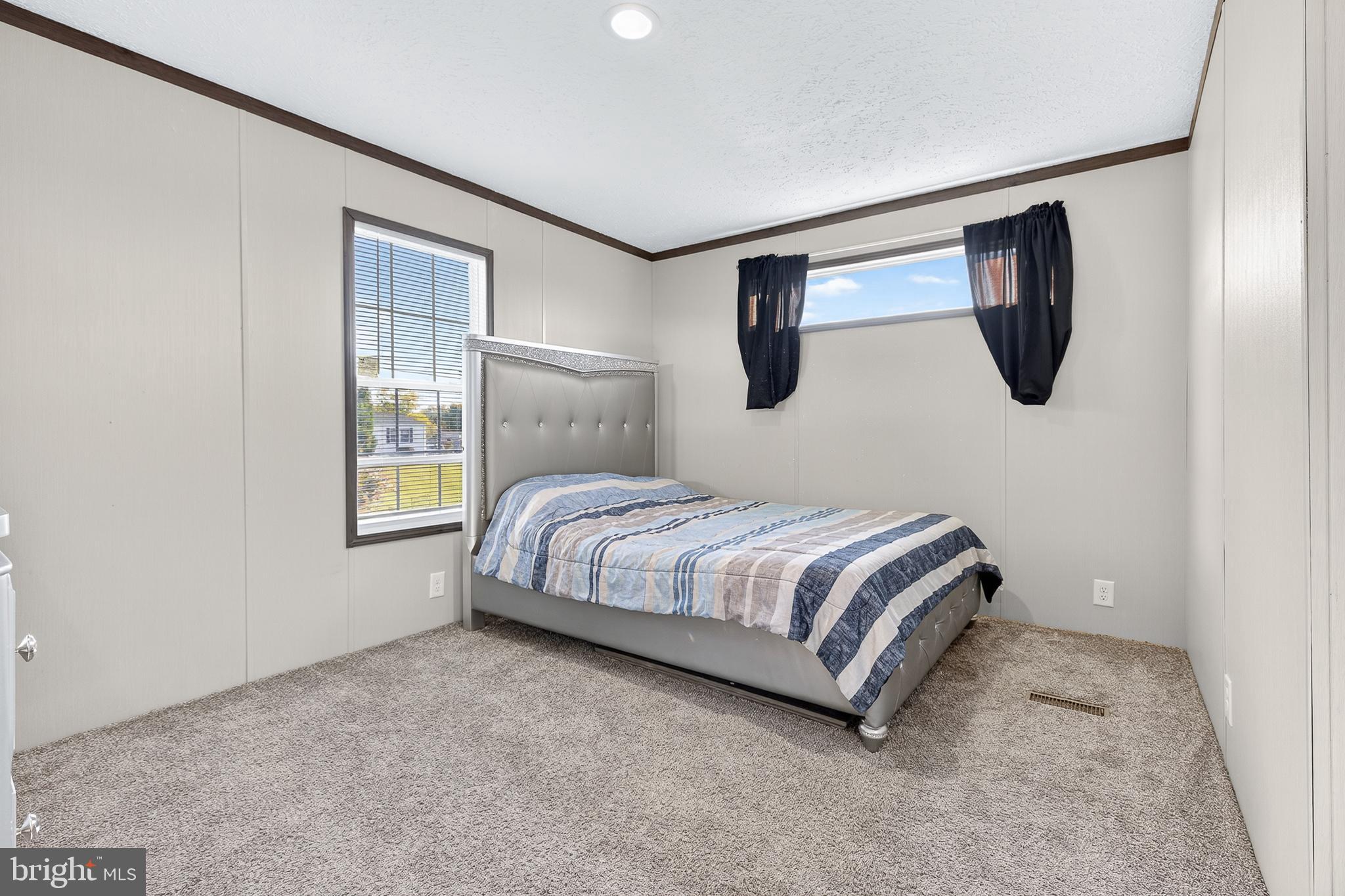 48 Dallas Drive Grantville, PA 17028 - Photo 11 of 30 a bedroom with a bed a window and painting on the wall