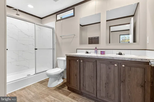 a view of an empty room and a window