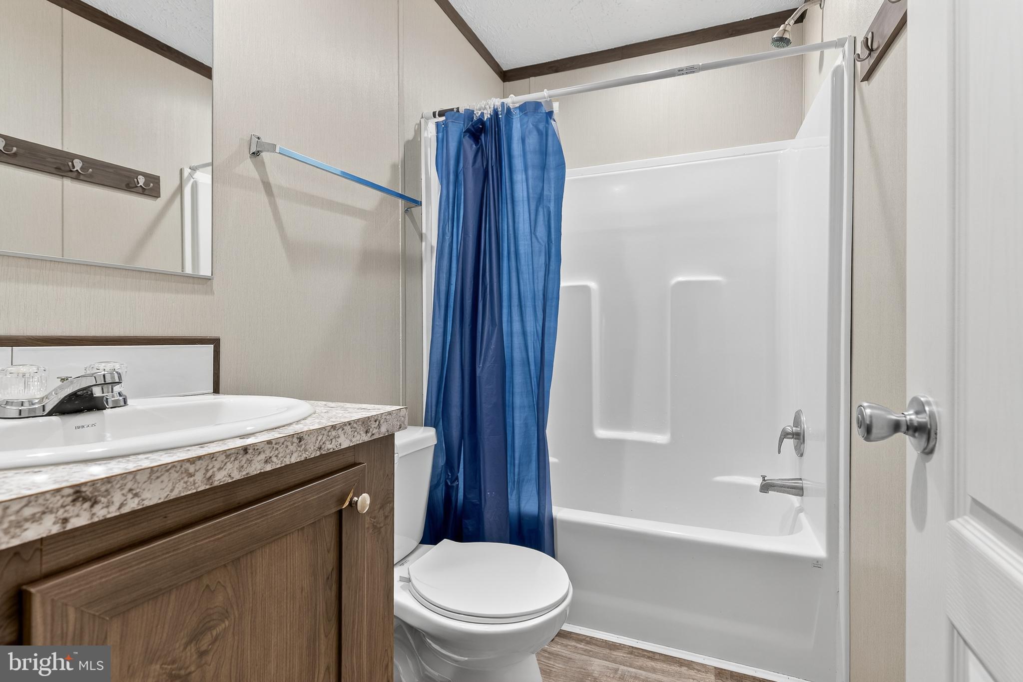 48 Dallas Drive Grantville, PA 17028 - Photo 19 of 30 a bathroom with a granite countertop sink toilet and shower