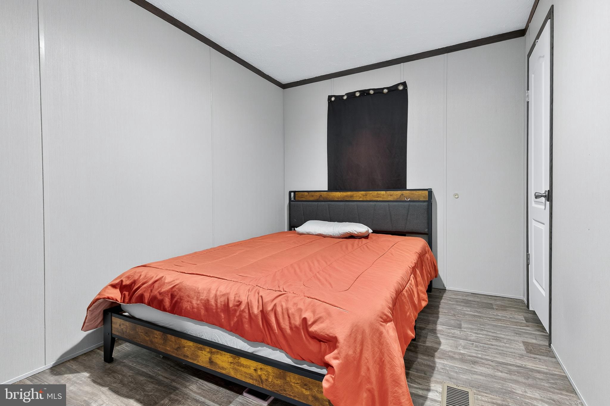 48 Dallas Drive Grantville, PA 17028 - Photo 21 of 30 a bedroom with a bed and wooden floor