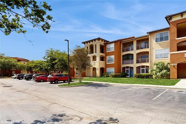 a front view of a building with garden