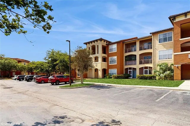 a front view of a building with garden