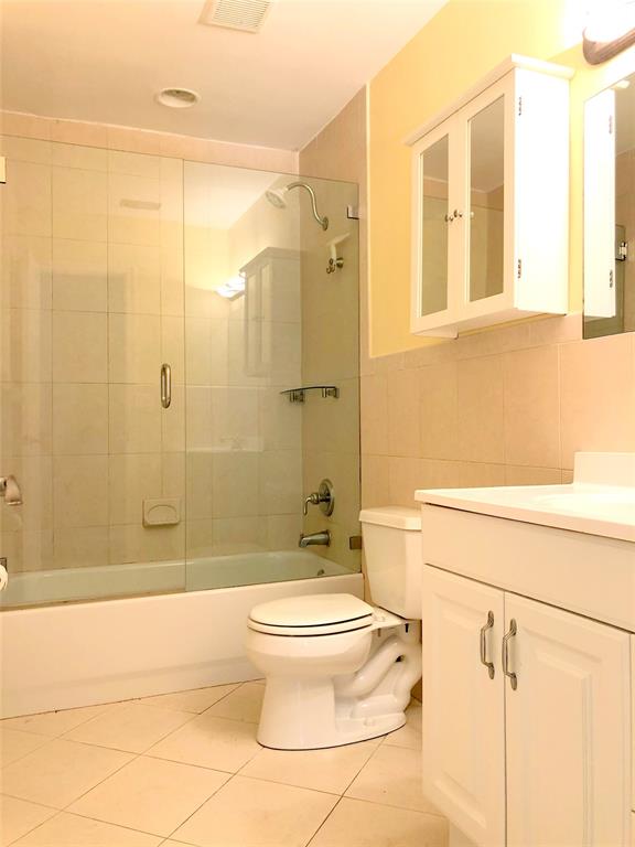 71 Laredo Lane Boca Raton, FL 33487 - Photo 17 of 18 a bathroom with a toilet and a shower