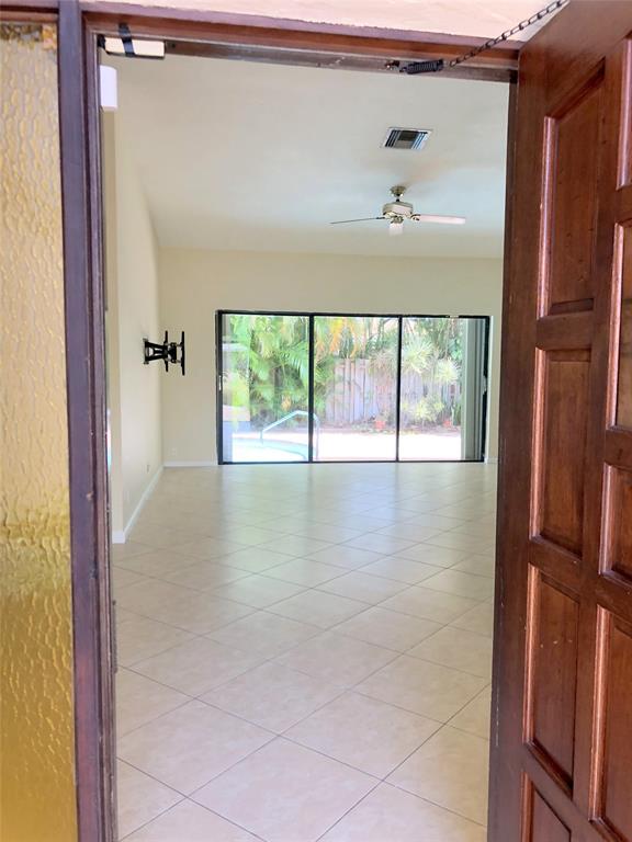 71 Laredo Lane Boca Raton, FL 33487 - Photo 6 of 18 a view of empty room with large window