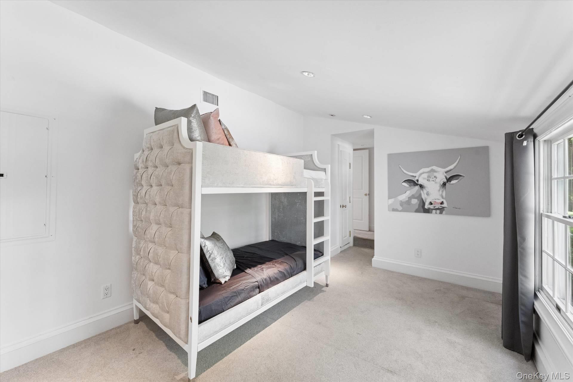 129 Oneck Lane Westhampton Beach, NY 11978 - Photo 21 of 32 a room with furniture and a fireplace