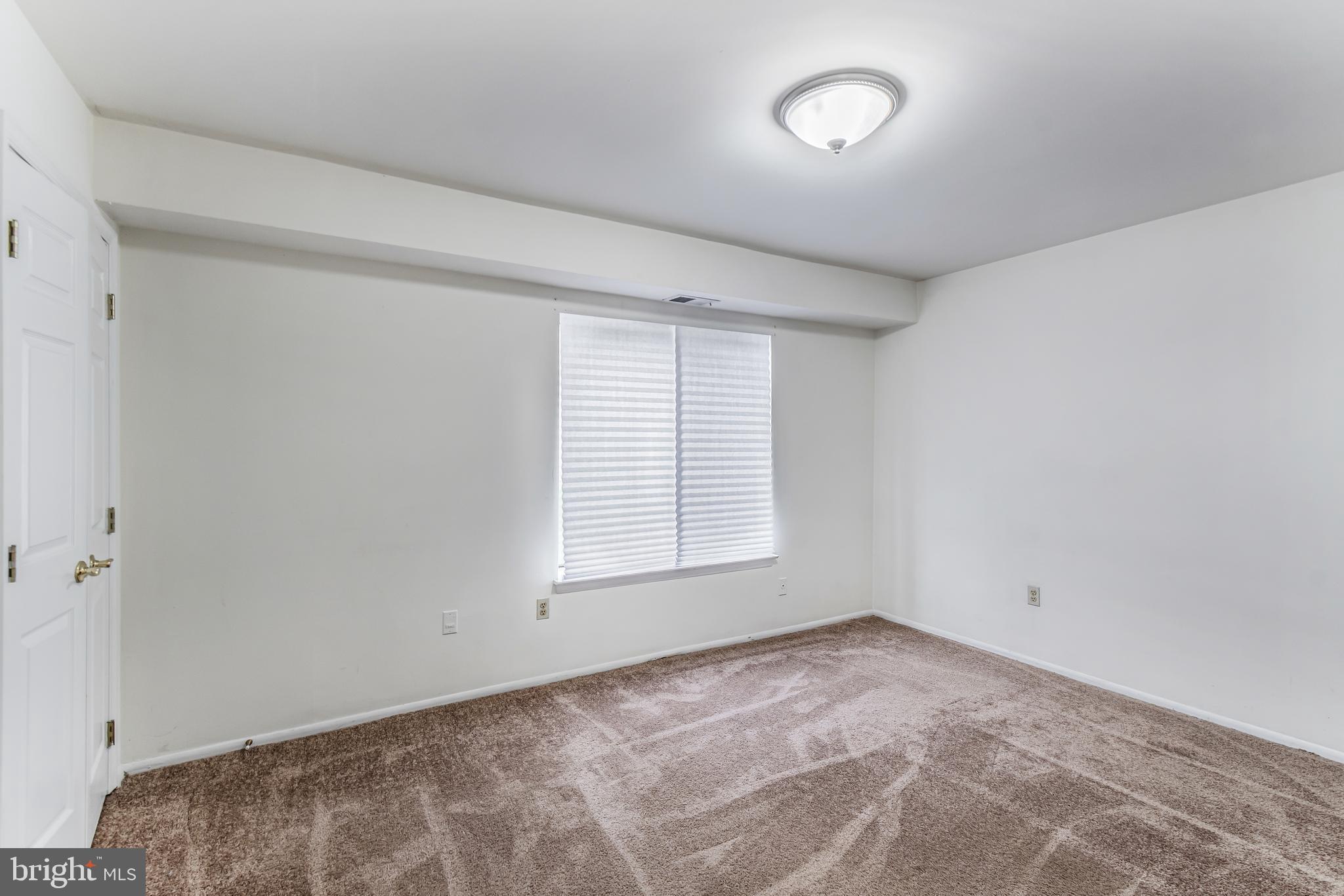 106 Mountain Road, Unit 1A Pasadena, MD 21122 - Photo 14 of 29 a view of a room that has a window in it
