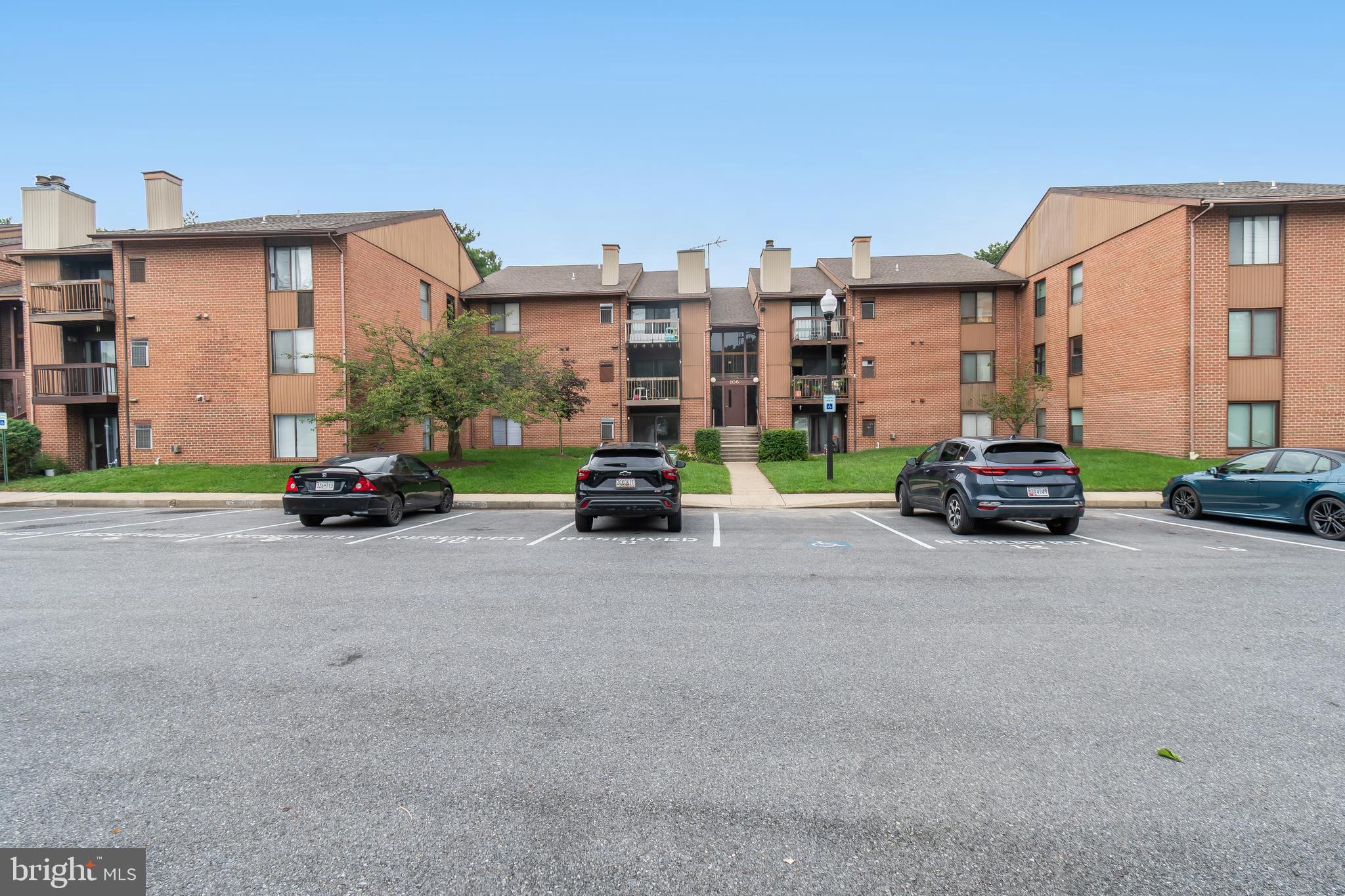 106 Mountain Road, Unit 1A Pasadena, MD 21122 - Photo 29 of 29 a car parked in front of a building