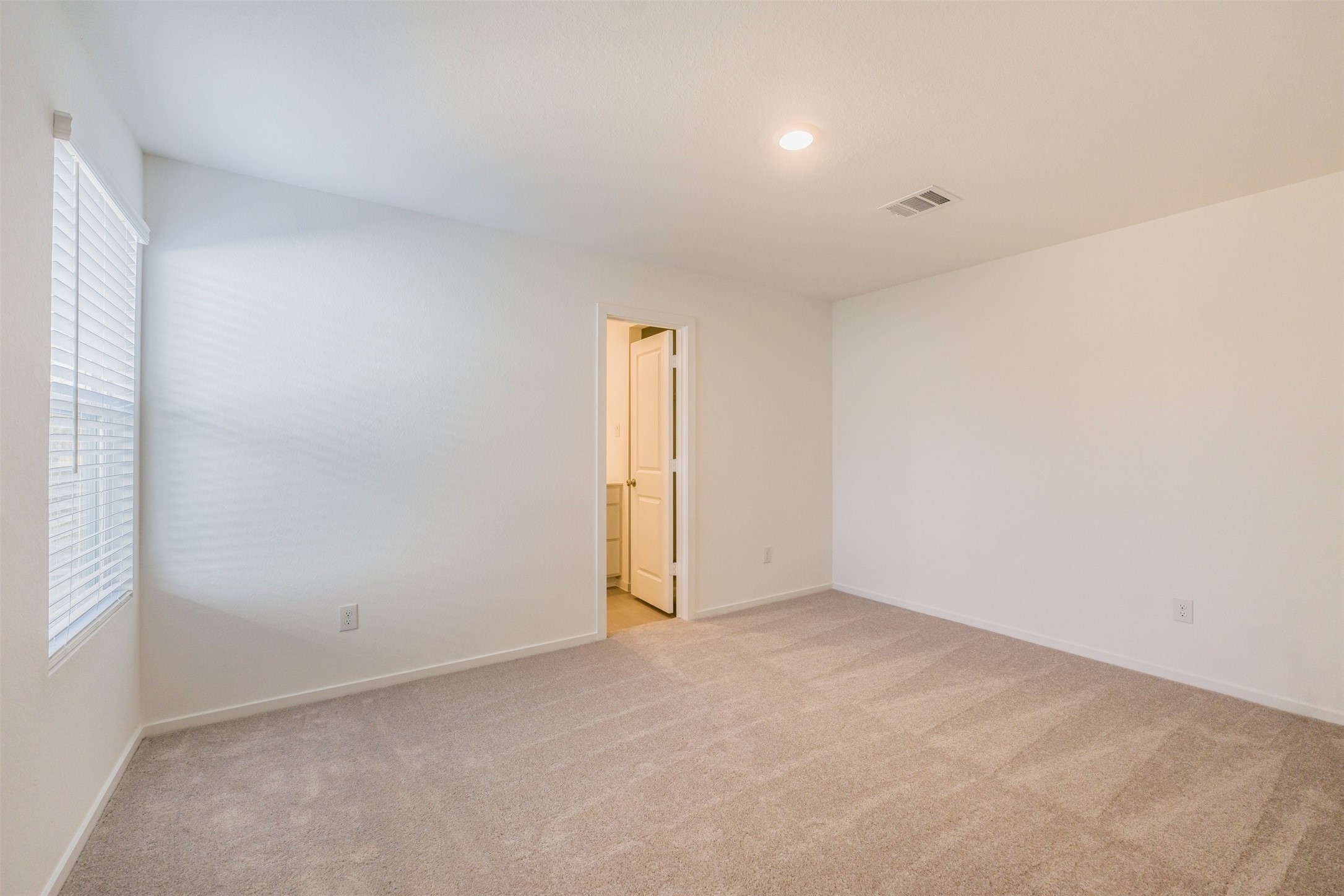 919 Pertuso Lane Huffman, TX 77336 - Photo 19 of 24 an empty room with an entryway