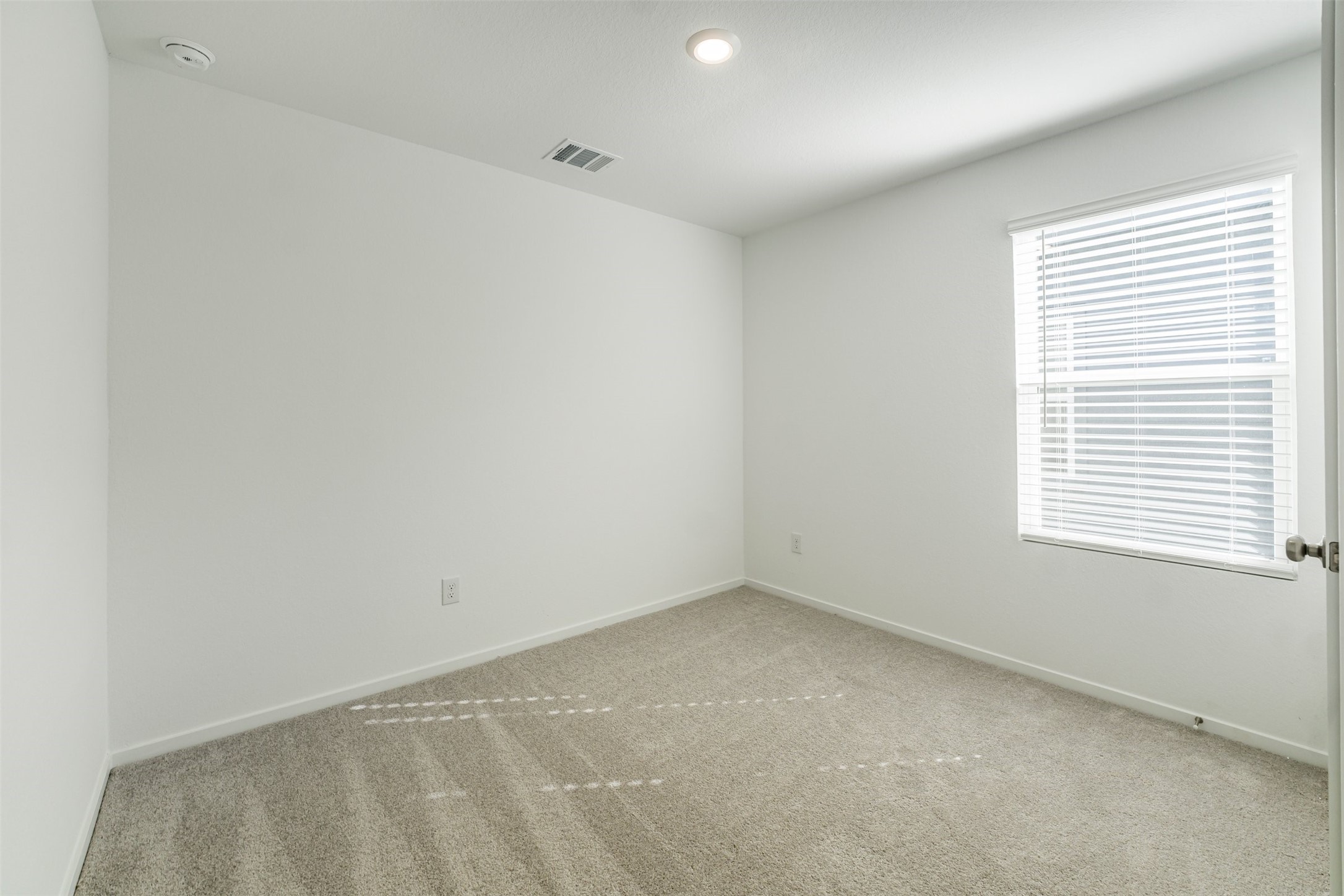 919 Pertuso Lane Huffman, TX 77336 - Photo 22 of 24 an empty room with a window