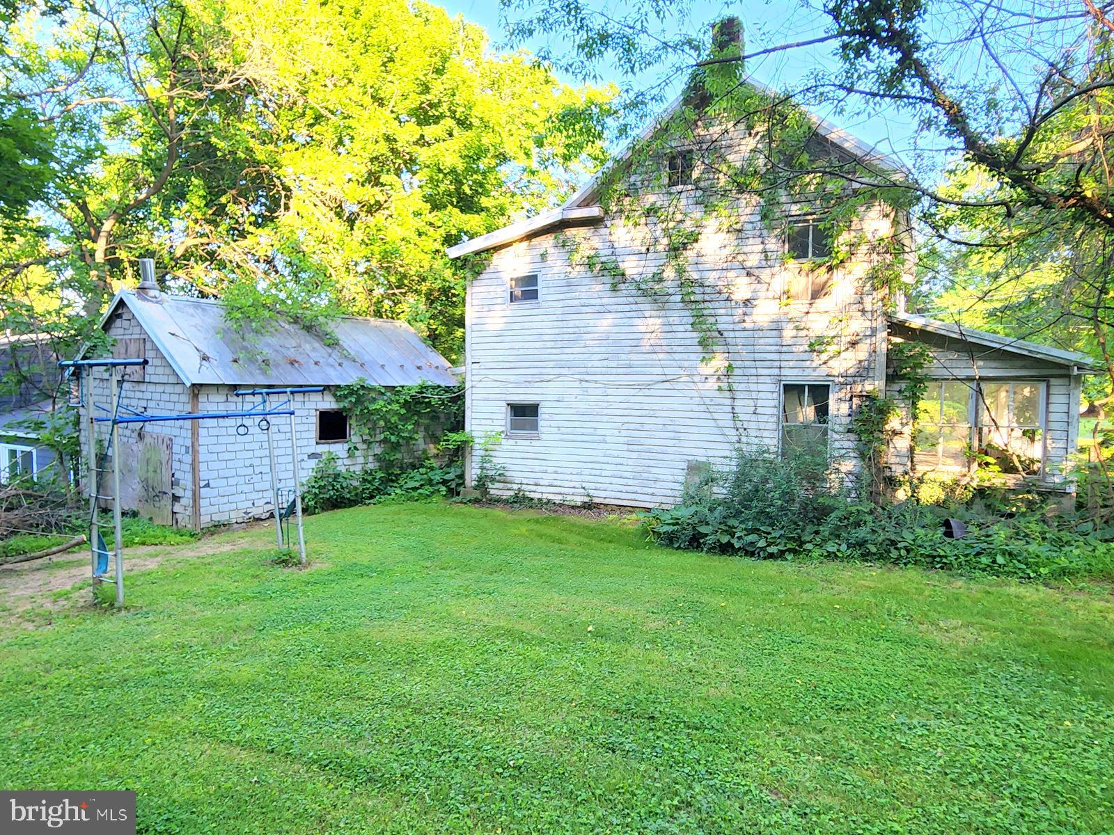 26506 Clarksburg Road Clarksburg, MD 20871 - Photo 24 of 39 a view of a house with a yard