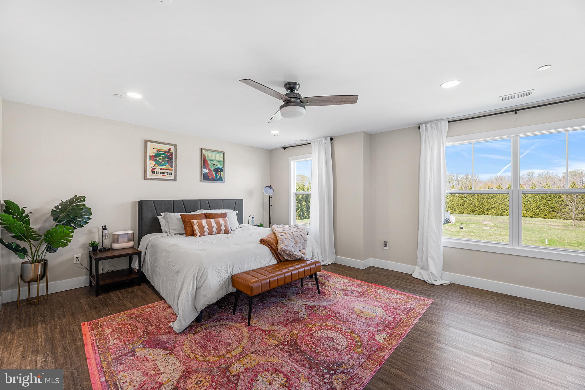 24766 Tribbett Circle Ridgely, MD 21660 - Photo 18 of 41 Spacious primary suite with tall windows