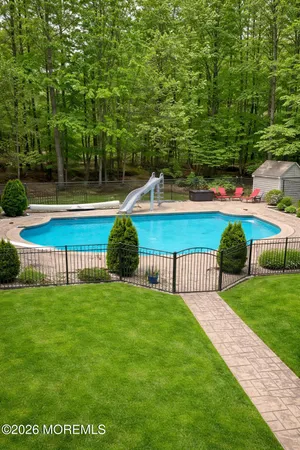 a view of a garden and deck