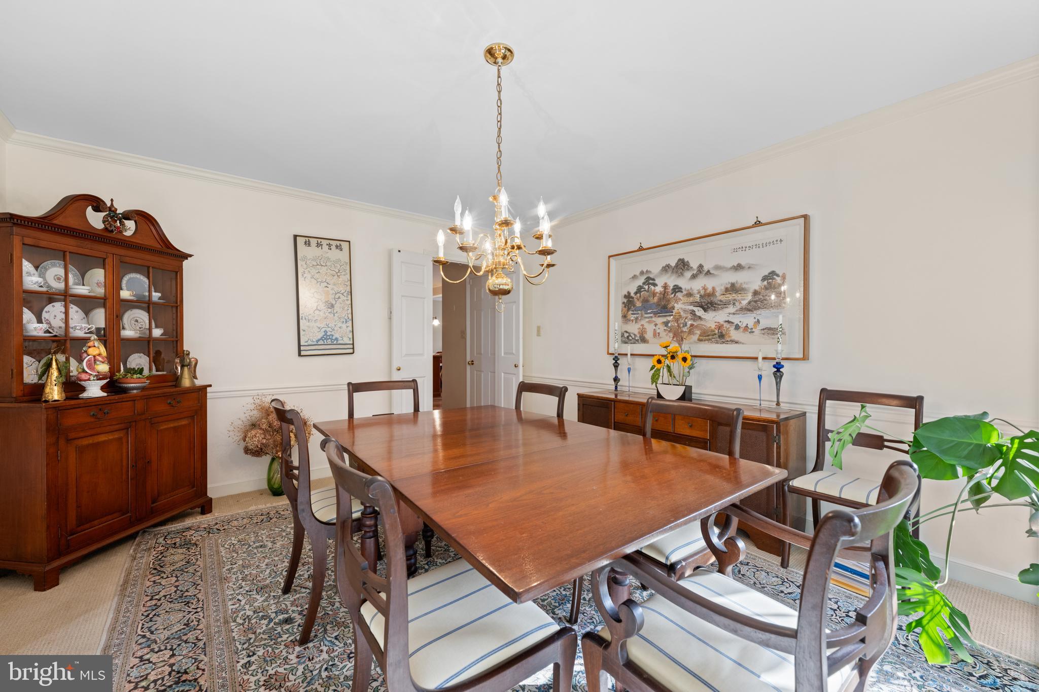 32 Manchester Court, Unit 32 Berwyn, PA 19312 - Photo 12 of 27 a dining room with furniture and window