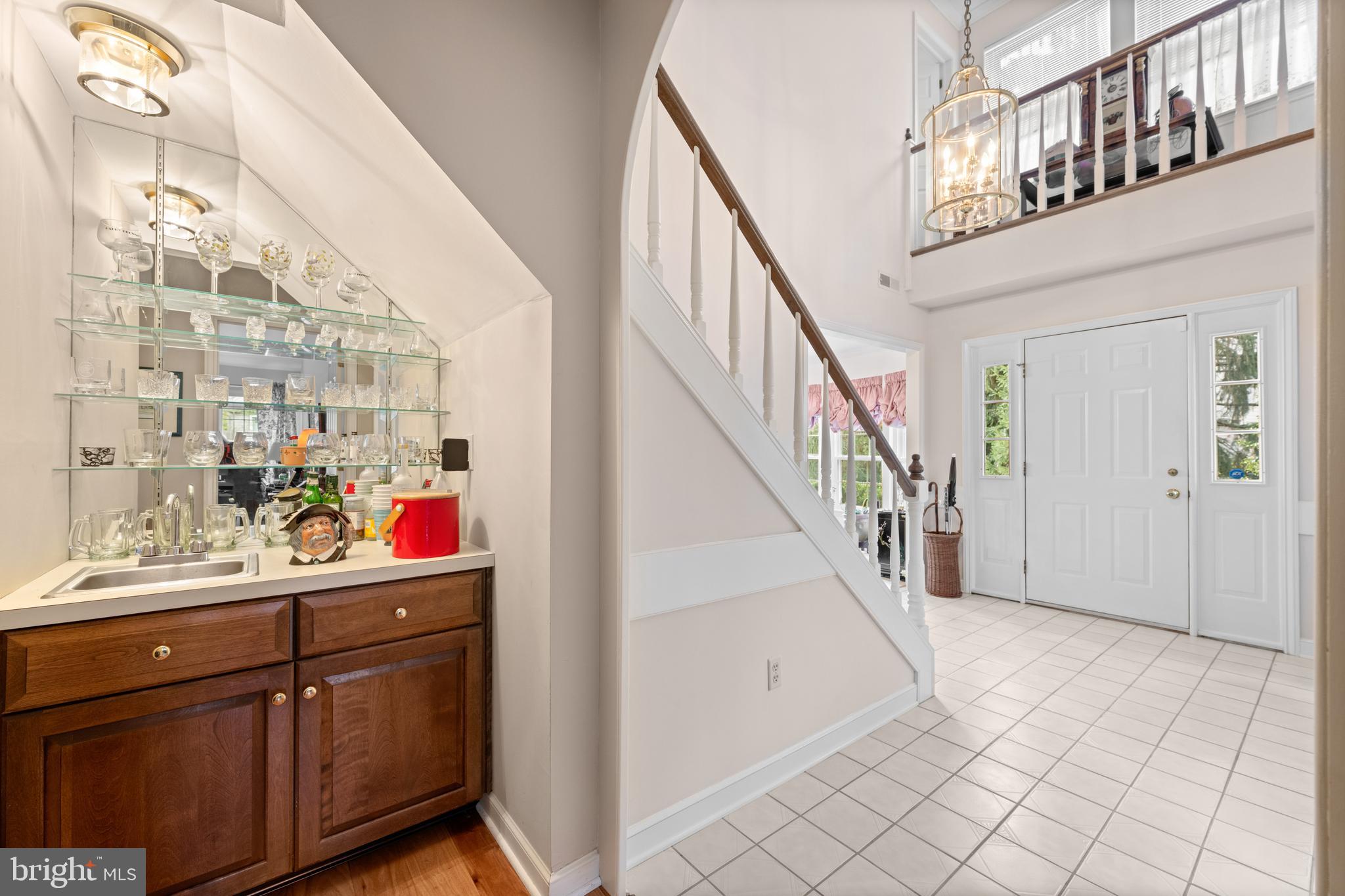 32 Manchester Court, Unit 32 Berwyn, PA 19312 - Photo 17 of 27 a view of a hallway with washer and dryer