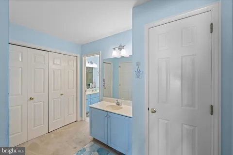 a bathroom with a tub and shower