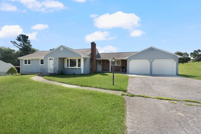 a house view with a garden space