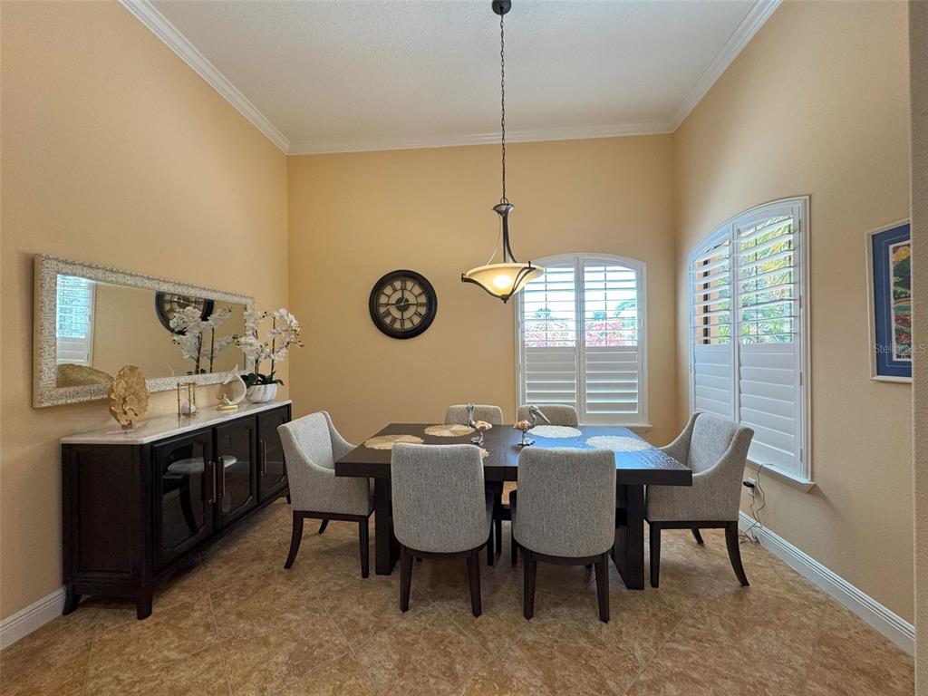 1024 West Beagle Run Loop Hernando, FL 34442 - Photo 20 of 44 a view of a dining room with furniture and window