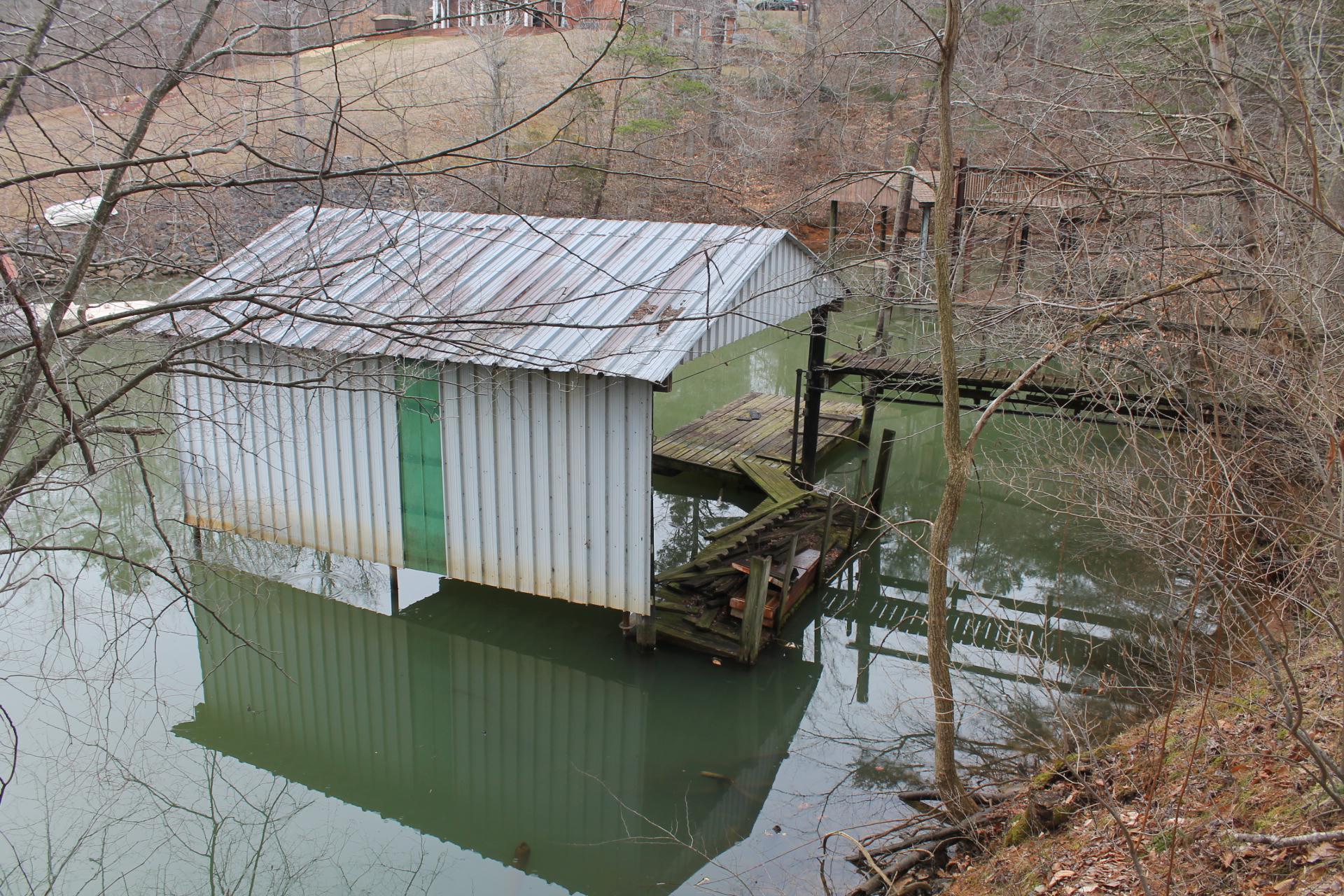 1153 Carters Island Road Goodview, VA 24095 - Photo 5 of 29 a backyard of a house with lake view