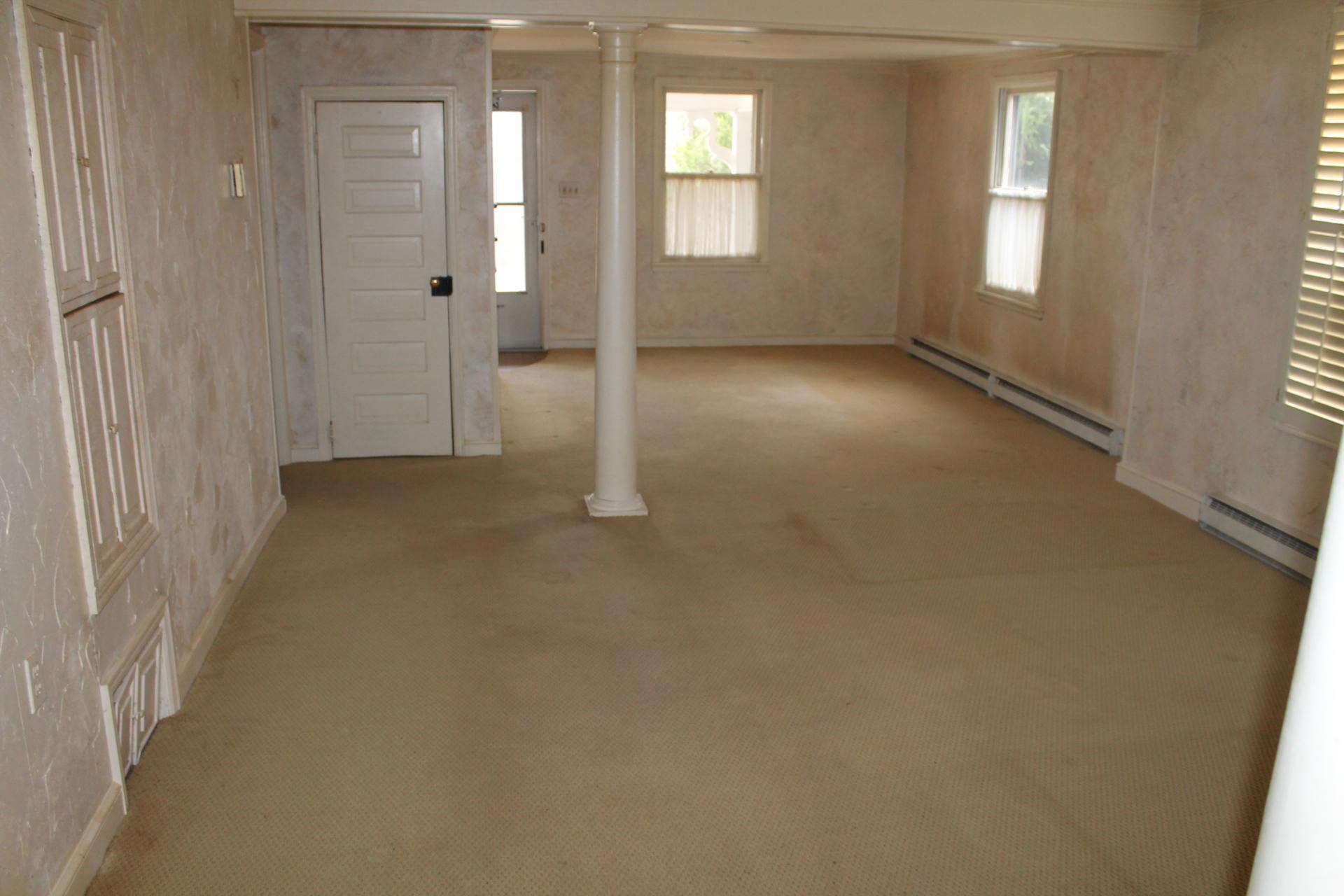 1153 Carters Island Road Goodview, VA 24095 - Photo 10 of 29 an empty room with windows and closet