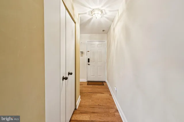 a view of a bathroom from a hallway