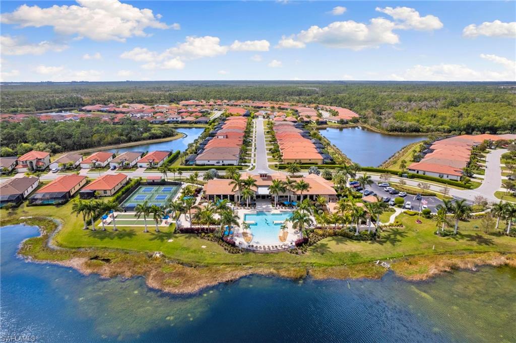 1350 Kendari Terrace Naples, FL 34113 - Photo 39 of 47 Aerial view of residential area featuring a large body of water
