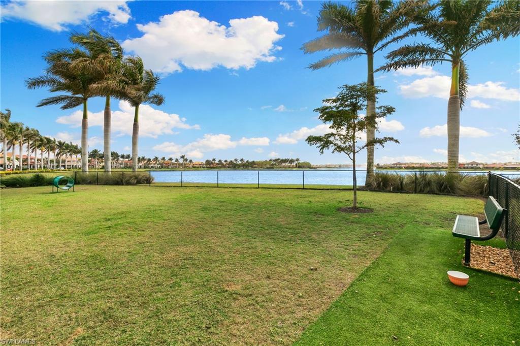 1350 Kendari Terrace Naples, FL 34113 - Photo 40 of 47 View of yard with a dog friendly area and a water view