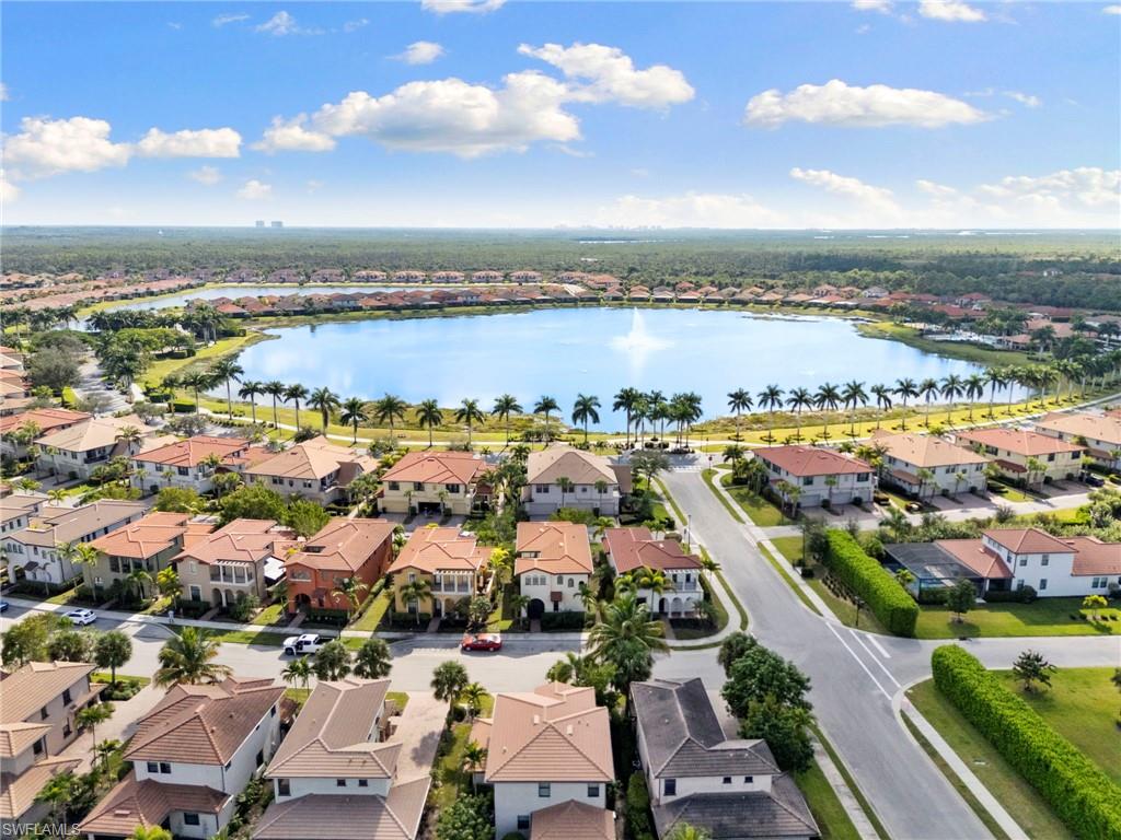 1350 Kendari Terrace Naples, FL 34113 - Photo 44 of 47 Aerial view of residential area with a nearby body of water
