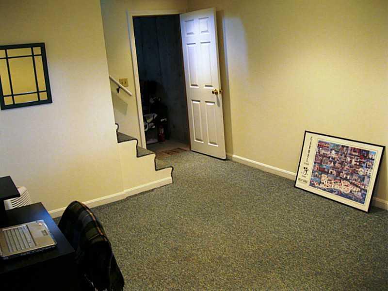 61 Stuart Street Portland, ME 04103 - Photo 24 of 33 Family Room. Family room in basement