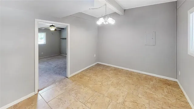 an empty room with a bathroom