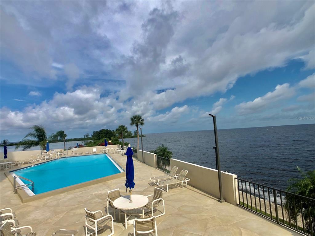 6035 Sea Ranch Drive, Unit 901 Hudson, FL 34667 - Photo 18 of 72 a view of a terrace with chairs