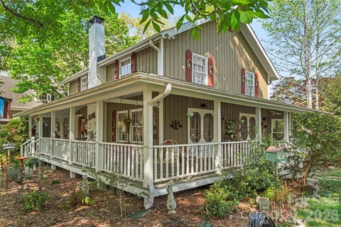a view of a house with a small yard