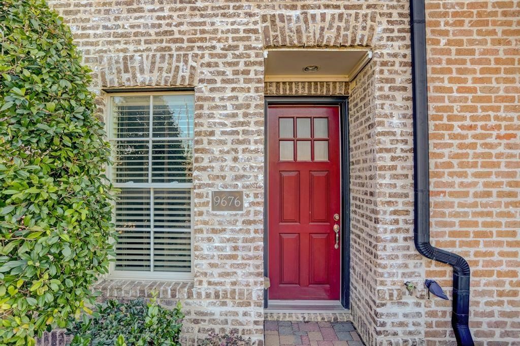 9676 Knight Road Houston, TX 77045 - Photo 10 of 11 a front view of a building with glass windows