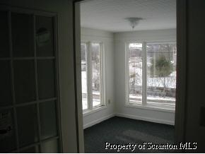 1340 Randolph Road Great Bend, PA 18821 - Photo 7 of 8 a view of an empty room and window