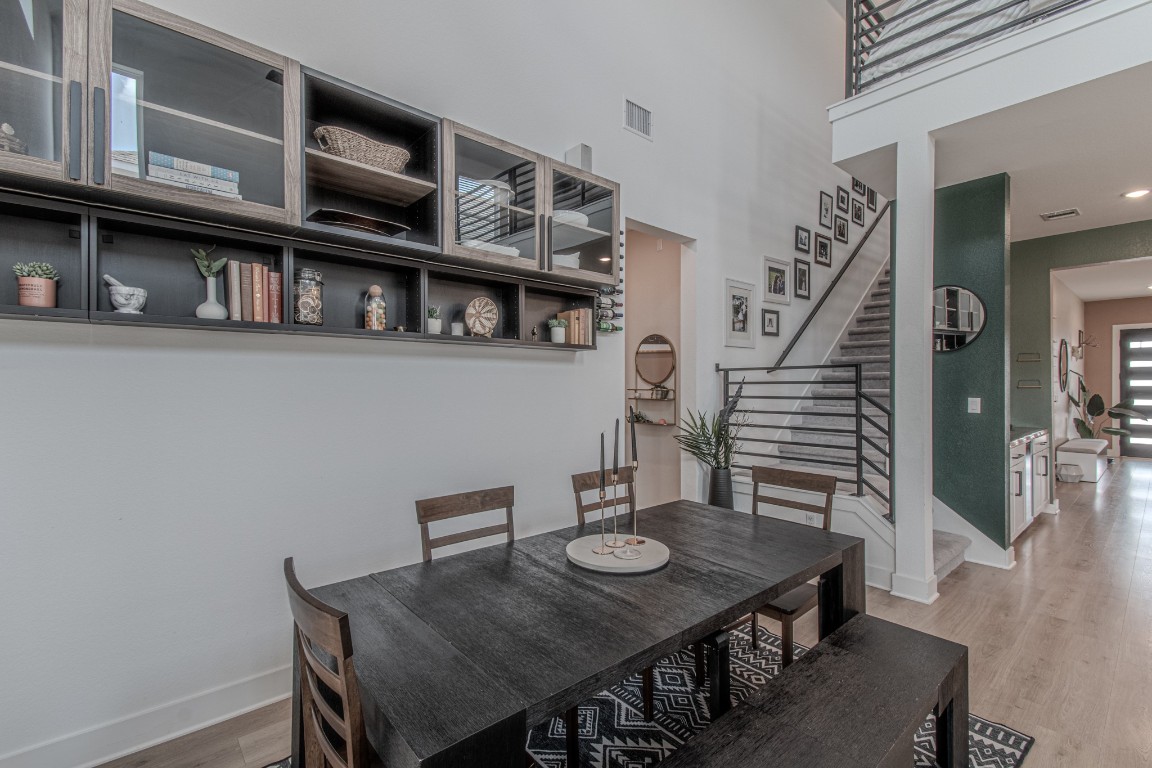 308 Millbend Road Georgetown, TX 78633 - Photo 11 of 40 a view of a dining room with furniture and wooden floor