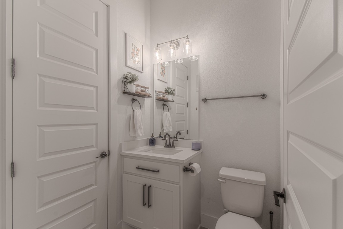 308 Millbend Road Georgetown, TX 78633 - Photo 21 of 40 a bathroom with a sink a toilet and shower