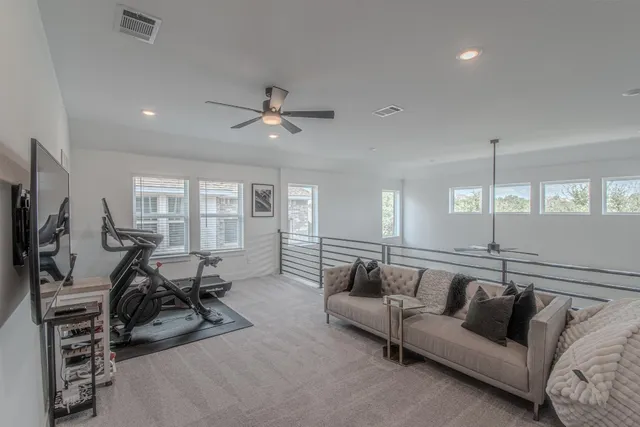 a room with a cabinets and a dresser
